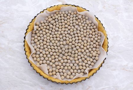 Photo for "Ceramic beans in an uncooked pie crust" - Royalty Free Image