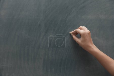 Photo for Man hand writing on Blackboard - Royalty Free Image