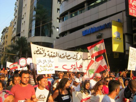 Photo for LEBANON, Beirut: Protesters take to the streets of Beirut on September 21, 2015 as part of the #YouStink movement rallying against alleged government corruption. - Royalty Free Image