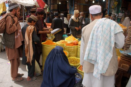 Photo for Afghanistan, Kandahar: Crowd are out shopping in Charso Bazaar for Eid on September 22, 2015. - Royalty Free Image