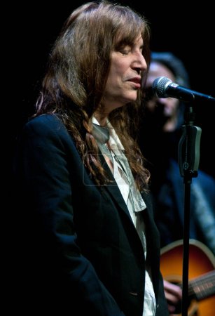 Photo for FRANCE, Paris : American artist Patti Smith sings her very first album Horses released in 1975 in La Cit de la Musique in Paris on January 17, 2011. - Royalty Free Image