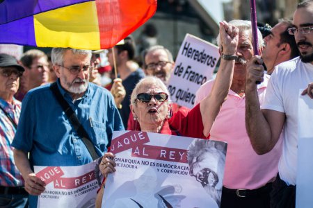 Photo for SPAIN, Madrid: Protesters demand an end to the Spanish monarchy march to the Royal Palace of Madrid on September 27, 2015. The march coincided with elections in Catalonia seen by many as a referendum on separation from Spain. - Royalty Free Image