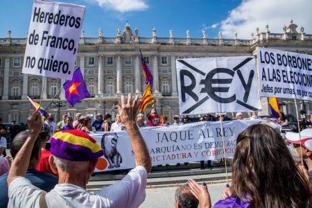 Photo for SPAIN, Madrid: Protesters demand an end to the Spanish monarchy march to the Royal Palace of Madrid on September 27, 2015. The march coincided with elections in Catalonia seen by many as a referendum on separation from Spain. - Royalty Free Image