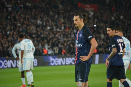 Photo for FRANCE, Paris : Zlatan Ibrahimovic hits a ball on the Parc des Princes field during a Ligue 1 match between Paris-Saint-Germain and Marseille on October 4th, 2015 - Royalty Free Image