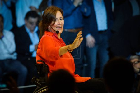 Photo for ARGENTINA, Cordoba: Gabriela Michetti, vice-presidential candidate from the opposition Cambiemos ('Let's change') party, waves to supporters at a final campaign rally in Cordoba, Argentina on October 22, 2015. - Royalty Free Image