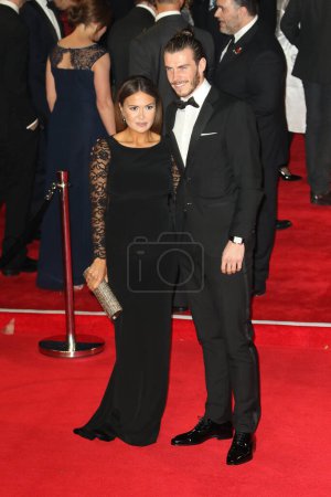 Photo for Emma Rhys-Jones and gareth bale at Film Premiere of Bond Spectre. London, United-Kingdom - Royalty Free Image