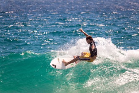 Foto de Surfer carreras Quiksilver y Roxy Pro World Title Event, 2012 - Imagen libre de derechos