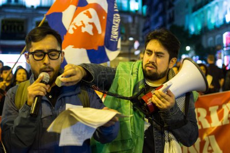 Téléchargez les photos : ESPAGNE, Madrid : Manifestation populaire à Madrid le 30 octobre 2015 pour protester contre l'impérialisme en Amérique latine. - en image libre de droit