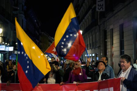 Téléchargez les photos : ESPAGNE, Madrid : Manifestation populaire à Madrid le 30 octobre 2015 pour protester contre l'impérialisme en Amérique latine. - en image libre de droit