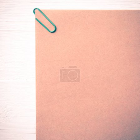Photo for Brown paper with green paper clip vintage style - Royalty Free Image