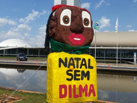 Photo for BRAZIL, Brasilia: A colorful sign is posted as protesters camp out beside Brazil's National Congress in Brasilia on November 7, 2015 as part of the movement to impeach President Dilma Rousseff. - Royalty Free Image