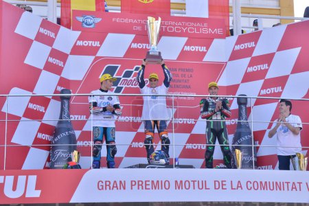 Photo for SPAIN, Cheste: Podium after the Moto3 race at the Valencia Grand Prix at Ricardo Tormo racetrack in Cheste, near Valencia on November 8, 2015. - Royalty Free Image