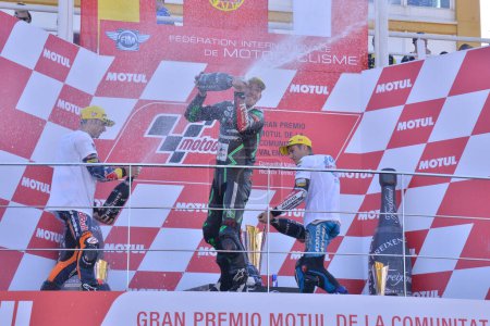 Photo for SPAIN, Cheste: Podium after the Moto3 race at the Valencia Grand Prix at Ricardo Tormo racetrack in Cheste, near Valencia on November 8, 2015. - Royalty Free Image