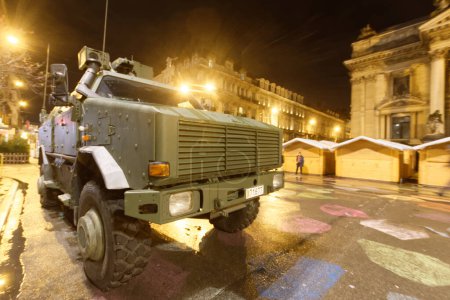 Photo for BELGIUM, Brussels: A Belgian military vehicle is seen in central Brussels, on November 21, 2015, after level four was set for Brussels based on a serious and imminent terror attacks threat. - Royalty Free Image