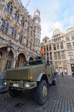 Photo for BELGIUM, Brussels: A Belgian military vehicle is seen in central Brussels, on November 22, 2015, after level four was set for Brussels based on a serious and imminent terror attacks threat. - Royalty Free Image