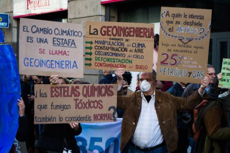 Photo for SPAIN, Madrid: Environmental activists gather in Spain's capital to take part in worldwide marches for climate change on November 29, 2015 - Royalty Free Image
