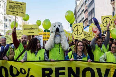 Photo for SPAIN, Madrid: Environmental activists gather in Spain's capital to take part in worldwide marches for climate change on November 29, 2015 - Royalty Free Image
