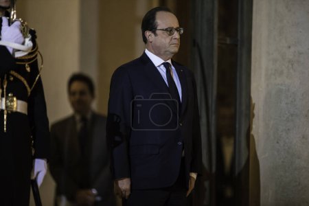 Photo for FRANCE, Paris : French President Francois Hollande waits at the Elysee palace for a meeting with Secretary-General of the United Nations Ban Ki-moon on November 29, 2015 in Paris. - Royalty Free Image