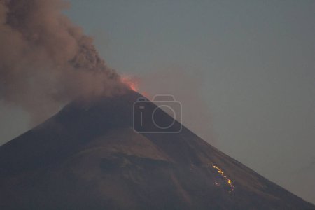 Photo for NICARAGUA, Leon: Nicaragua's Momotombo volcano continued its eruption on December 2, 2015.The volcano began spewing ash on December 1, the first confirmed eruption of Momotombo in 110 years. - Royalty Free Image