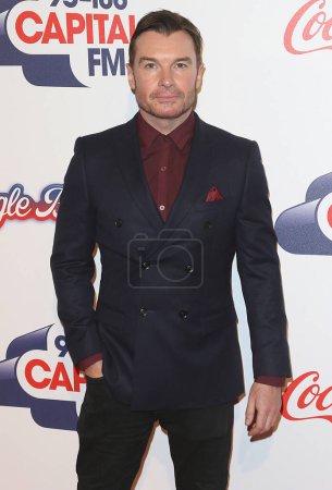 Téléchargez les photos : ROYAUME-UNI, Londres : Greg Burns assiste au Capital FM Jingle Bell Ball au 02 Arena à Londres le 6 décembre 2015. - en image libre de droit