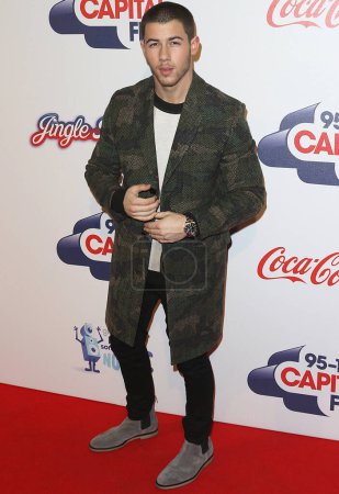 Foto de REINO UNIDO, Londres: Nick Jonas asiste a la Capital FM Jingle Bell Ball en 02 Arena en Londres el 6 de diciembre de 2015. - Imagen libre de derechos