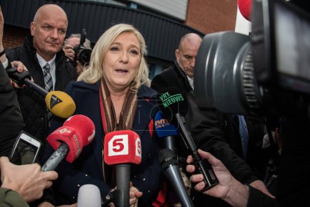 Photo for FRANCE, Henin-Beaumont : French far-right National Front (FN) leader Marine Le Pen delivers a speech following the announcement of results in the second round of French regional elections in Henin-Beaumont on December 13, 2015. - Royalty Free Image