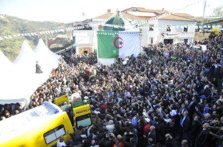 Photo for ALGERIA, At-Ahmed: Algerians pay tribute to late Algerian opposition figure Hocine Ait-Ahmed, on January 1, 2016 in his home village after his body was brought to his homeland for a state funeral. - Royalty Free Image