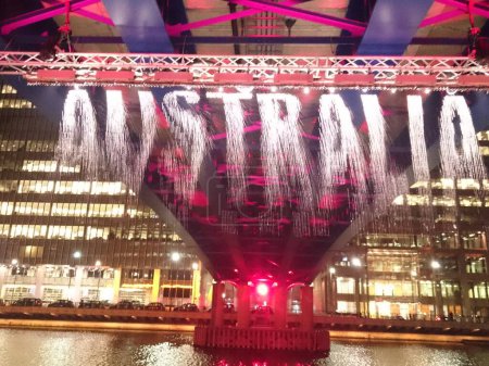 Photo for UK, London: A digital waterfall, one of 18 installations at the Canary Wharf Winter Lights festival, lights up London on January 11, 2016 as the festival opens. - Royalty Free Image