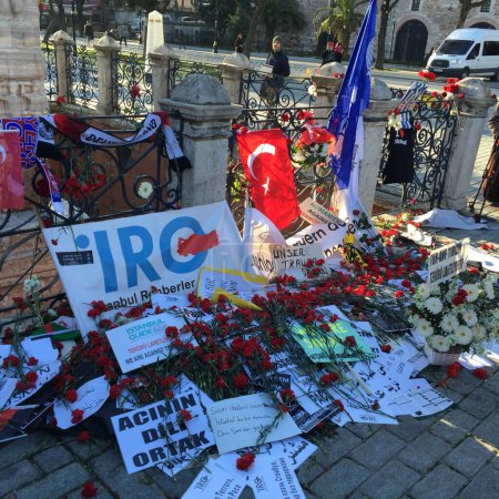 Photo for TURKEY, Istanbul: A memorial is set up for the victims of a suicide bombing in Sultanahmet Square in Istanbul, Turkey on January 14, 2016. - Royalty Free Image