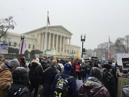 Photo for SA, Washington DC: A crowd of several thousand head toward the Supreme Court of the United States during the anti-abortion March for Life in Washington DC on January 22, 2016. The annual March for Life is held on January 22 - Royalty Free Image