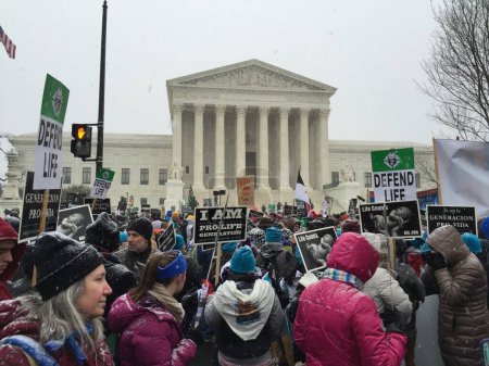 Photo for SA, Washington DC: A crowd of several thousand head toward the Supreme Court of the United States during the anti-abortion March for Life in Washington DC on January 22, 2016. The annual March for Life is held on January 22 - Royalty Free Image