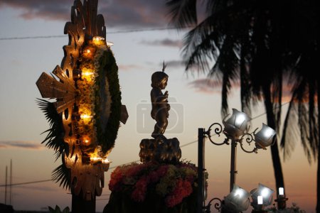 Photo for PHILIPPINES, Manila: Catholic worshippers holds a float during Santo Nino procession in Manila, Philippines, on January 31, 2016. Thousands take part in the parade that honors Baby Jesus. - Royalty Free Image