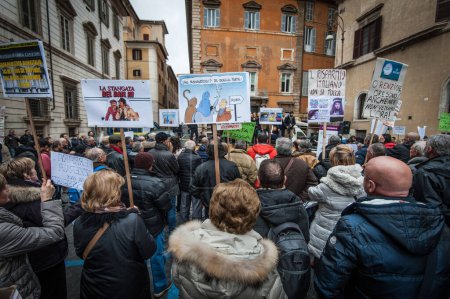 Photo for ITALY, Rome: As Italy's economy struggles in the face of a banking crisis, protesters fill the Piazza Santi Apostoli in Rome on January 31, 2016. - Royalty Free Image