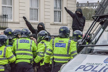 Photo for September 5, 2020 - Dover, UK: Far-right protesters clash with Dover police at anti-immigration demonstration turned violent in the southern English port. Tensions have spiked over a large increase in migrants crossing the English Channel from France - Royalty Free Image