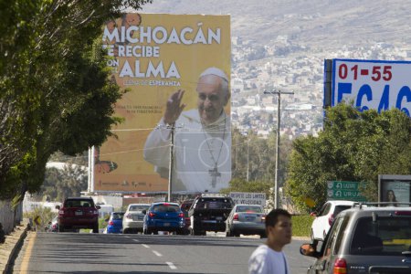 Foto de MEXICO, Morelia: A billboard for Pope Francis is on display on February 2, 2016, in Morelia before his scheduled visit to the country. - Imagen libre de derechos