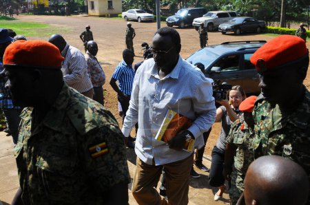 Photo for UGANDA, Kampala: General David Sejusa arrives at the military court in Makindye, a suburb of the capital Kampala, on February 2, 2016, during his first court appearance following his detention last week - Royalty Free Image
