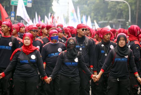 Photo for "INDONESIA, Jakarta: Thousands of  Indonesian labour union members take to the streets on February 6, 2016 - Royalty Free Image