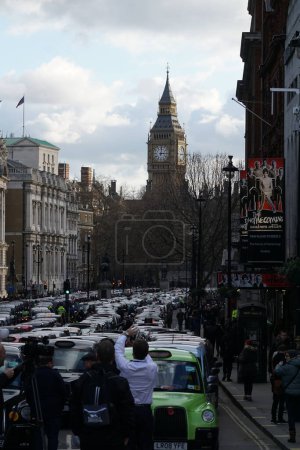 Photo for ENGLAND, London: Taxi cabs block the streets of London during a demonstration against Uber, on February 10, 2016. - Royalty Free Image