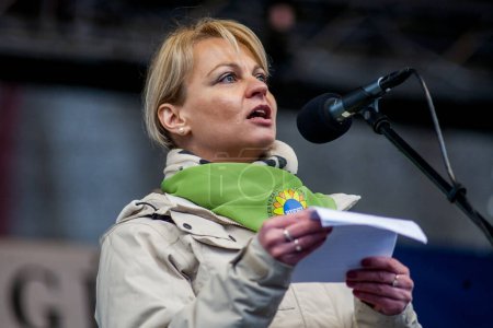 Photo for HUNGARY, Budapest: Chairwomen of the Nursery workers democratic union Viktoria Szucs speaks as Participants of a demonstration for teachers, parents in front of the parliament building in Budapest downtown on February 13, 2016 - Royalty Free Image