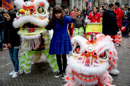 Photo for NETHERLANDS, The Hague: A dragon float parades through The Hague on February 13, 2016, for Chinese New Year celebrations. - Royalty Free Image