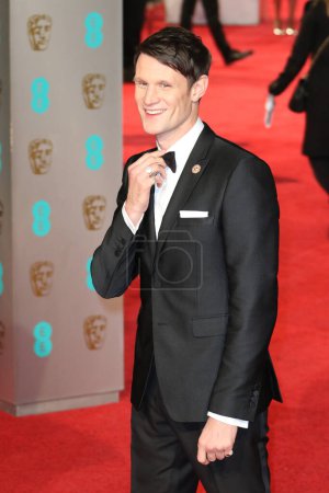 Téléchargez les photos : LONDRES, ANGLETERRE - 14 FÉVRIER : Matt Smith assiste aux EE British Academy Film Awards au Royal Opera House le 14 février 2016 à Londres, Angleterre. - en image libre de droit