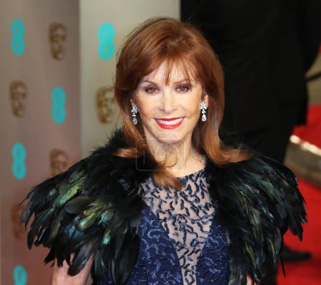 Photo for LONDON, ENGLAND - FEBRUARY 14: Stefanie Powers attends the EE British Academy Film Awards at The Royal Opera House on February 14, 2016 in London, England. - Royalty Free Image