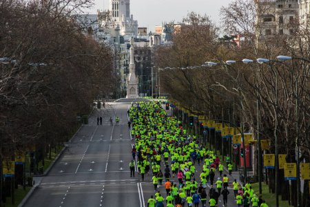 Foto de ESPAÑA, Madrid: La gente corre durante una carrera benéfica organizada por Amnistía Internacional, la Asociación de Apoyo al Pueblo Sirio y la Red de Acción de Madrid el 21 de febrero de 2016 en el centro de Madrid. - Imagen libre de derechos