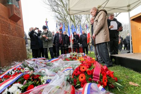 Photo for FRANCE, Paris: Louis Cortot, a Compagnon de la Liberation and WWII resistant, delivers a speech at the military cemetery of Ivry-sur-Seine, on February 21, 2016 at an annual ceremony in tribute to World War II Missak Manouchian French resistant group - Royalty Free Image