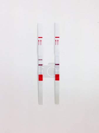 Photo for Positive and negative test cassette strips for analysis of HCG - Royalty Free Image
