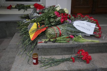 Photo for Rusia, moscow: A makeshift memorial has taken shape at the Belgian Embassy in moscow, rusia following the terror attacks that left at least 30 dead and hundreds injured in Brussels, Belgium on March 22, 2016 - Royalty Free Image