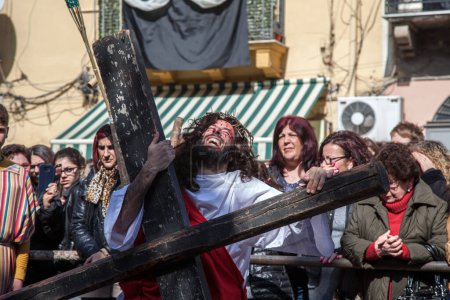 Photo for PROCIDA, ITALY - MARCH 25, 2016 - Every year the procession of the "Misteri" is celebrated at Easter's Good Friday in Procida, Italy. Islanders carry through the streets elaborate and heavy "Misteries" representing scenes from The Bible. - Royalty Free Image