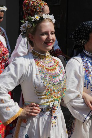 Photo for People wearing croatian national costumes on the street - Royalty Free Image