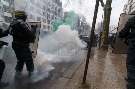 Photo for FRANCE, Marseille: Protesters face police during a demonstration against the French government's planned labour law reforms on March 31, 2016 in Paris - Royalty Free Image