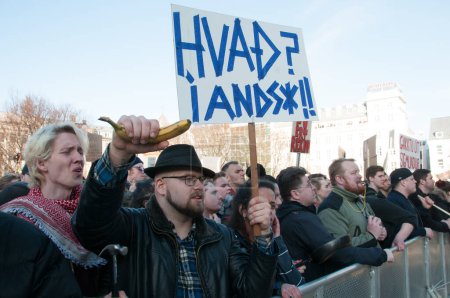 Photo for Iceland, Reykjavik -  April 4, 2016: Crowds gather outside Iceland's parliament demanding the Prime Minister step down over allegations he concealed investments in an offshore company in Reykjavik - Royalty Free Image